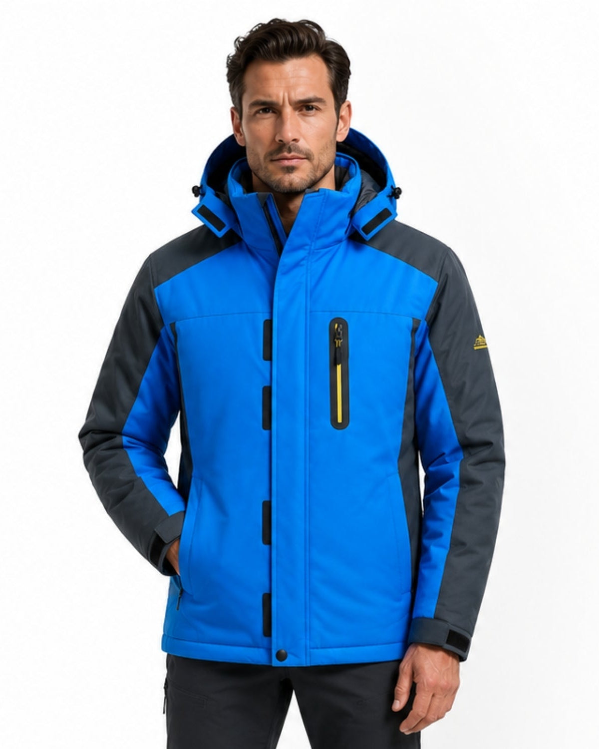 Men's waterproof winter performance parka in cobalt blue and grey, front view on model.